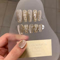 Silver-white scepter Buccellati champagne-colored French cat-eye high-quality handmade press-on nails wholesale from the source manufacturer